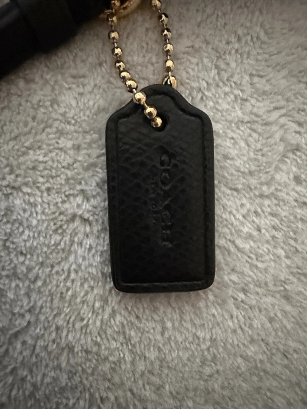 Coach Black Pebbled Leather Wristlet with Gold Logo